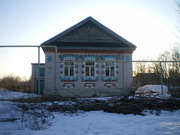 Кирпичный дом в жилом селе